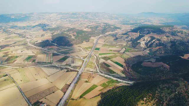Aerial highway cutting through Kula Fairy Chimneys landscape