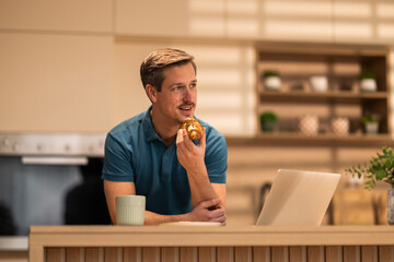 Man Eating Breakfast Before Work From Home