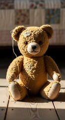 Vintage Teddy Bear Sitting on Wooden Surface in Sunlight.