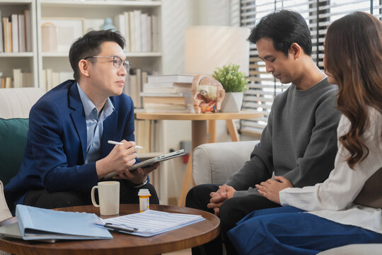 couples therapy session, a marriage counselor consults with a young couple for family therapy, offering relationship counseling, marriage help, family support, anxiety therapy, depression support