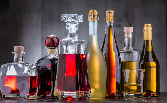 Carafe and bottles of assorted alcoholic beverages.