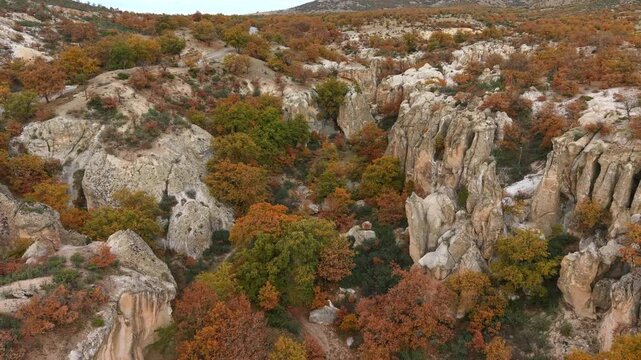 Aerial view of ancient rock formations and vibrant autumn hues in the Phrygian (Frig) Valley in Afyonkarahisar