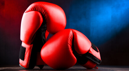 Pair of red leather boxing gloves