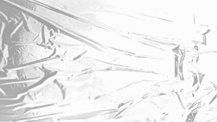 Obraz premium Plastic wrap texture overlay effect on black background. Shrink wrapped plastic sleeve for cover