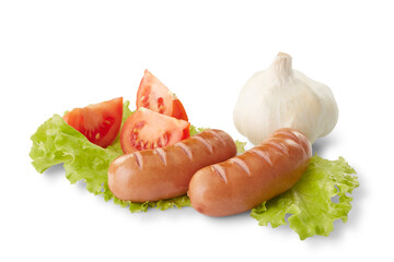 Grilled sausages with fresh lettuce, tomatoes, and garlic