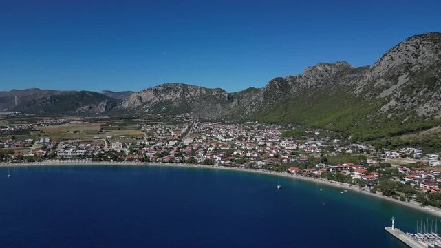 Cinematic Drone Approach to Oren Tatil Koyu Beach and Coastal Landscape