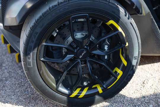Wroclaw, Poland - June 21, 2025: Close up of BAC branded alloy wheel rim with carbon fiber detail and performance tire on high performance sports car. Exclusive automotive engineering