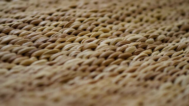 Textured Woven Rattan Backdrop. Artisanal Wicker Mat With Warm Beige Tones And Textured Pattern