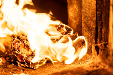 The moment the paper money burned fiercely inside the incense burner