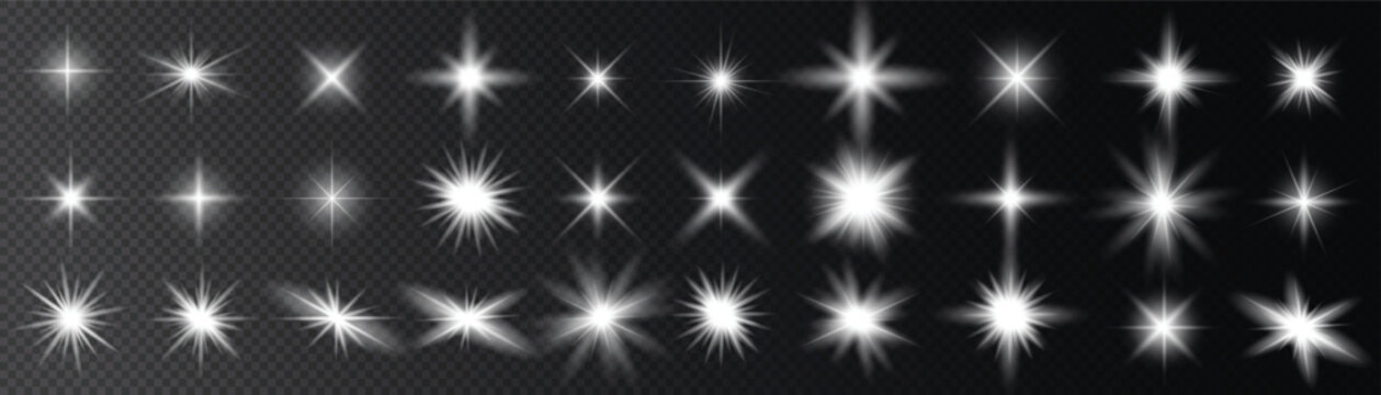Collection of white light burst effects on dark background