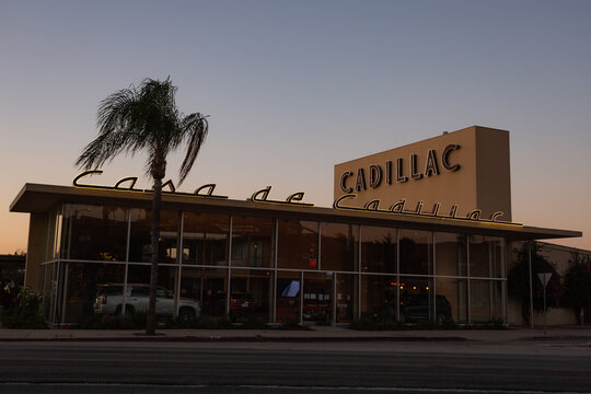 Twilight falls on the Casa de Cadillac dealership, built in 1949. Sherman Oaks, California. August 2020