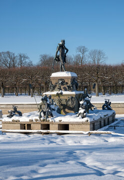 PETRODVORETS, RUSSIA - FEBRUARY 14, 2026: Fountain "Neptune" on a winter day. Upper Park of the Peterhof Palace and Park Ensemble, Russia (vertical)