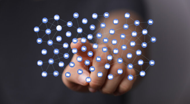 Digital network concept with hand interacting with file icons. Perfect for data storage, cloud computing, technology and