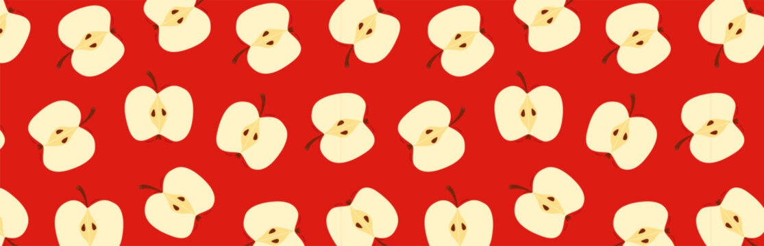 Seamless pattern of cut apple halves with seeds on vibrant red background.Repeating fruit texture with apple halves, perfect for fabric, wrapping paper, packaging, wallpaper and food design projects.