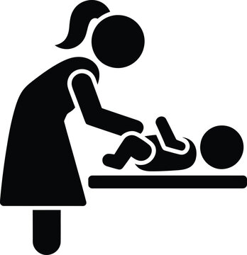 A woman changing a baby on a changing table