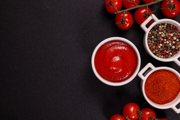Fresh tomatoes and spices arranged for cooking