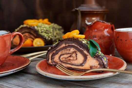 Trendy Shrovetide roll of chocolade  thin pancakes with cream