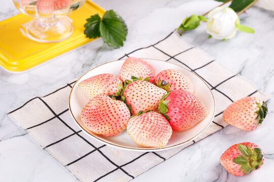 Fresh White Strawberries with Pink Blush in Bowl on Marble Kitchen Counter