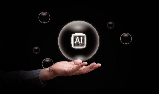 AI bubble concept. Human hand holding an AI chip inside a transparent bubbles, Fragile tech boom, speculation, rapid investment growth, hype, market panic risk for artificial intelligence technology.