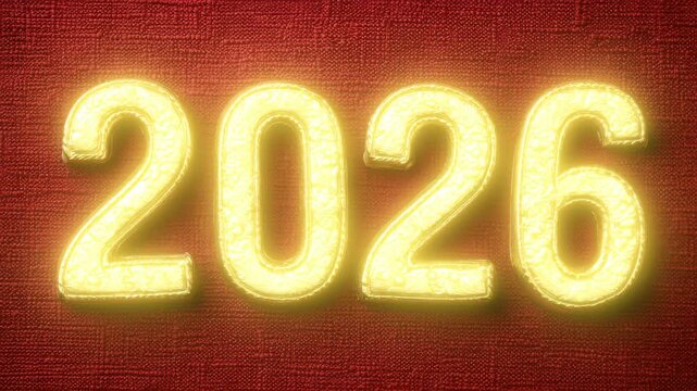Ornate golden numerals represent the year 2026 against a textured red background, symbolizing hopes and aspirations for the new year.