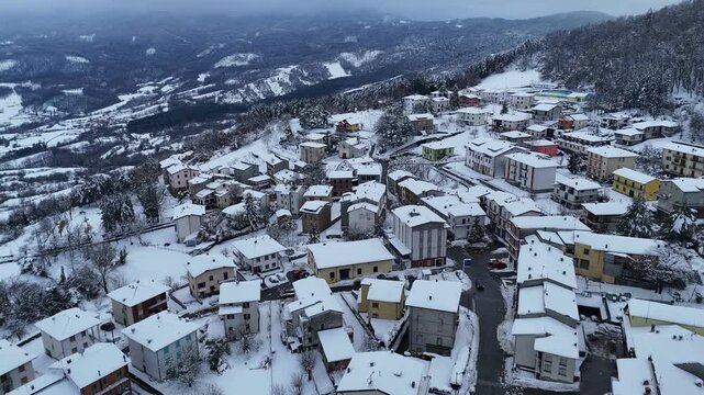 Le Bore village in Parma province, Italy covered in winter snow
