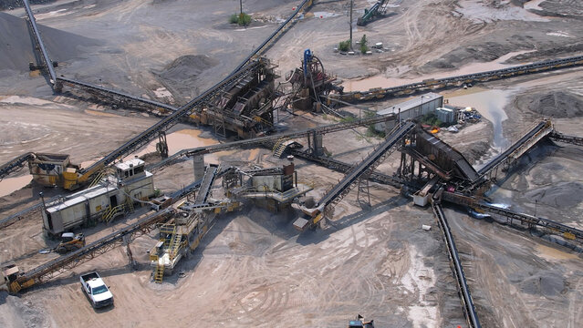 Canadian landscape of rare earth mining site. Critical rare earth minerals used for technology, weapon and electric vehicles. Concept of industry, nature, and environmental impact