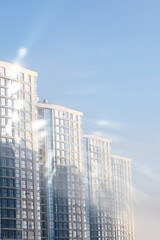 Naklejka premium Lavish metropolitan towers demonstrating commitment to ecological principles and modern architecture