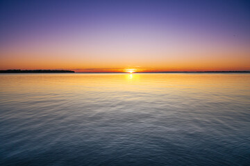 Obraz premium Sunset over midwest lake