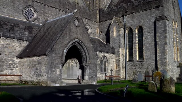 Kilkenny, Ireland. 10-30-2023. Cathedral Cemetery of St. Canice in a sunny day. Panning 4K