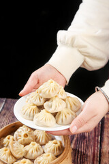 Freshly Steamed Xiao Long Bao Chinese Soup Dumplings Served on White Plate Traditional Asian Dim Sum Breakfast Cuisine