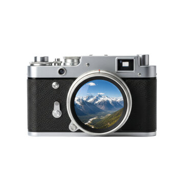 Vintage camera showing snowy mountains and forest landscape
