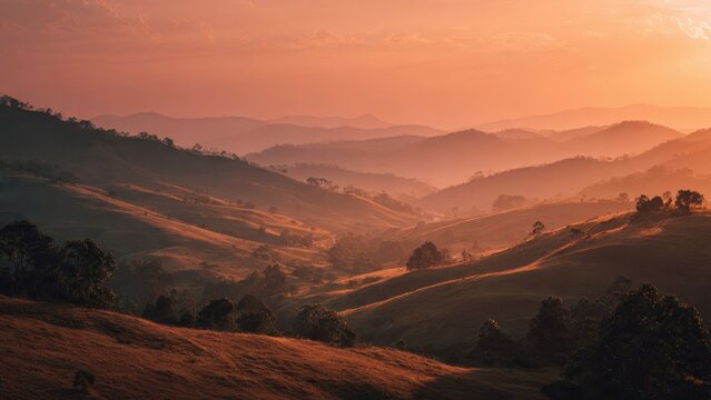 Sunset over rolling hills landscape