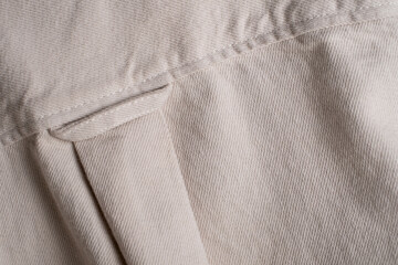 Macro View of Beige Cotton Twill Fabric with Reinforced Double Stitching Detail