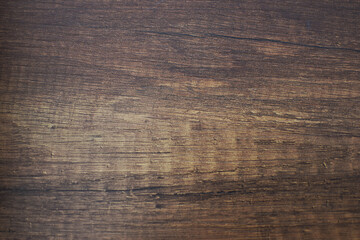Obraz premium Natural wood texture background with detailed grain pattern. Rustic timber surface close up showing organic lines and warm brown tones.