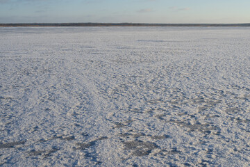 Winter frozen river ice texture with snow patterns abstract natural cold background surface