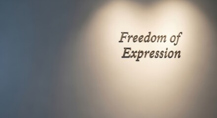 Fototapeta premium Freedom of expression inscription on the wall