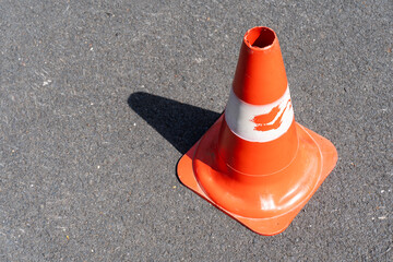 Orange signal buoys on gray asphalt © ZenitX