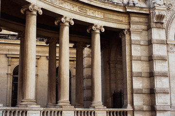 Obraz premium Historic architectural columns in classic stone building exterior design