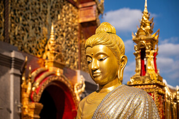 Chiang Mai, Thailand &ndash; Portrait of a golden Buddha statue at Wat Phra That Doi Suthep Temple, the most famous temple in Chiang Mai.