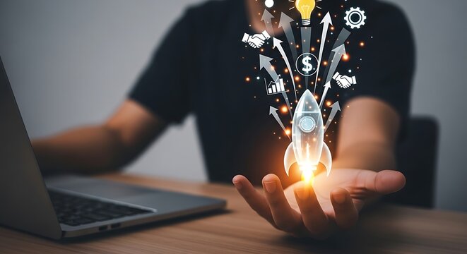 Man holding a glowing lightbulb with creative business icons.