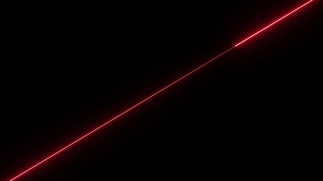 Thin red laser line diagonally crossing black background with soft glow
