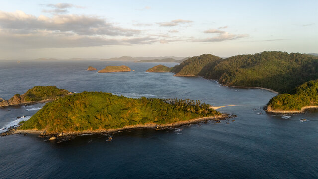 Drone aerial view of Bongalisian Island and its sandbar in Linacapan near Coron, The Philippines.