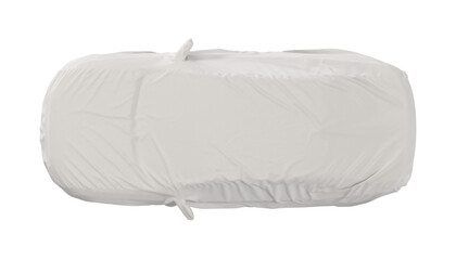 White fabric car cover protecting vehicle from dust and scratches on white background