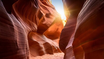 sandy sculpted canyon passage sunlight streams through