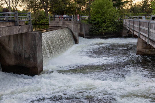Water cascading over concrete dam in Smiths Falls, Canada