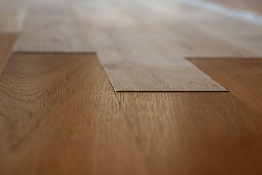 wooden parquet floor repair process with height difference