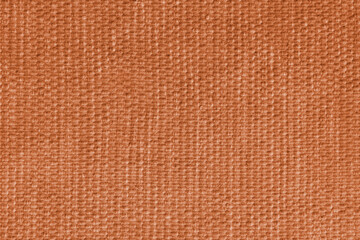 Fototapeta premium Orange upholstery fabric, textile texture with detailed woven textile pattern, close up, macro. Cloth background for interior design, furniture, wallpapers, decor, packaging and creative backdrops.