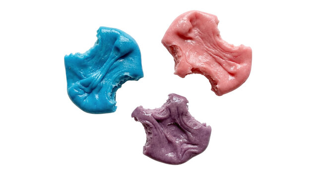 Three colorful pieces of chewed bubble gum in pink, blue, and purple isolated on a transparent background.