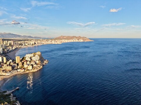 vibrant coastal area with leisure boat activities, popular digital nomad hub with stunning bayfront views