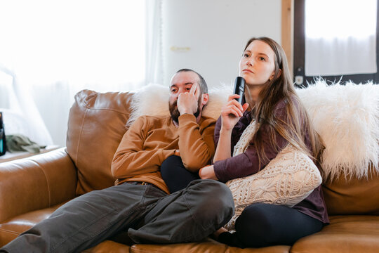 Couple Zoning out Watching TV